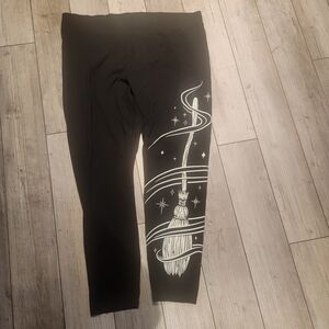 Torrid Black Leggings with White Broom Design